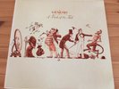 Genesis A Trick of the Tail LP 1st press vinyl nr mint lovely sleeve