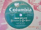 45 RPM RECORD,BOB DYLAN, MUST BE SANTA & 'TWAS THE NIGHT BEFORE CHRISTMAS. MINT
