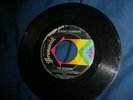 Demures 45 rpm BRUNSWICK  'Raining Teardrops'
