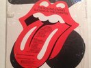 Rolling Stones Sucking In The Seventies LP NM vinyl w/ sticker