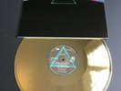 Gold vinyl record Pink Floyd The dark side of the moon + album's photo