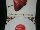 The Wildhearts – Mondo Akimbo A-Go-Go. Bronze ?– YZ669TX, White Vinyl, 12