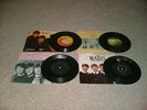 BEATLES FOUR SINGLES IN PICTURE SLEEVES
