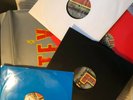 - 4xLP - Quadruple Vinyl in Sleek Metallic-Looking Sleeve