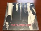 In A Priest Driven Ambulance by The Flaming Lips, Violet Mix Vinyl (1990)