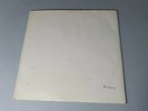 Dischogs Collection  The Beatles White Album No. 0569512 LP Vinyl Record.