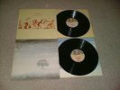 TWO UK GENESIS LPS - A TRICK OF THE TAIL & WIND & WUTHERING NEAR MINT CONDITION