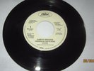 45 rpm-Garth Brooks-Friends in Low Places / Nobody Gets Off in This Town-Capitol