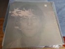 john lennon /  imagine still has shrink on cover.comes with post card pic