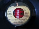 The Beatles John Lennon Promo Apple 45 record AIN'T THAT A SHAME, 1975 clean