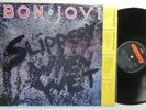 BON JOVI      slippery when wet