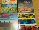 The police, Styx, MR .Mister, Men at work all for 1 bid