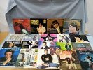 Bundle Of 21 Records Mixed Genre Tom Jones Meatloaf John Lennon Rick Astley #952
