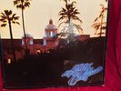 Hotel California by Eagles)- Asylum 7-E 1084 LP. NM Vinyl  w/Poster  Gatefold