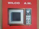 Wilco - A.M. LP  (2015) *(Red/Tangerine Vinyl)* (Vinyl Me, Please Edition)
