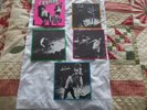 THE CRAMPS SMELL OF FEMALE 4 X 7 INCH COLOURED VINYL SINGLES IN CARD SLIPCASE