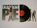 WARRANT CHERRY PIE LP 1ST PRESS 1990 CBS SPAIN HOLE IN COVER PROMO? Glam Hard