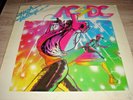 Vinyle 33t AC/DC  ( HIGH - VOLTAGE 1976 ) pochette abimé vinyle en bon état.