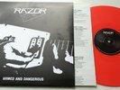 Razor	Armed and Dangerous	US LIMITED  RED VINYL LP #398 OF 550 MADE   (111)