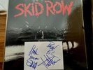 Signed skid row 1st pressing of skid row with signed card with L.O.A.