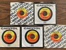 FIVE 45s OF THE BEATLES WITH CAPITOL SLEEVES HELP HARD DAYS NIGHT HOLD YOUR HAND