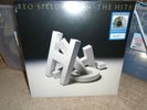 REO SPEEDWAGON...THE HITS...BLACK & WHITE SPATTER VINYL...