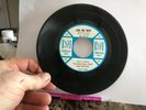 A very special group of Beatles' 45's They value in price from $400.00 to $1,000