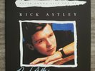 signed never gonna give you up (7” blue vinyl) autographed rick astley