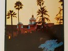 THE EAGLES - HOTEL CALIFORNIA - VINYL LP ALBUM - RARE FIRST PRESS W/POSTER - VG+