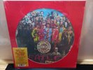The Beatles Sgt Peppers 12 Inch Picture Disc Album.