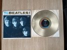 The Beatles Lp Record ￼MEET  THE BEATLES Gold Colored