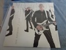 joe satriani /what happens next cover still has shrink.