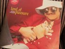 sticky fingers land of pleasure vinyl - includes caress your soul