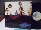 THE EAGLES HOTEL CALIFORNIA  ON ASYLUM  RECORDS W/ POSTER EXC-NM