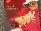 Land of Pleasure by Sticky Fingers (Record, 2014) includes Caress your Soul 