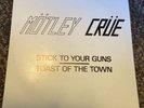 Motley Crue Stick To Your Guns / Toast Of The Town 7 inch Vinyl