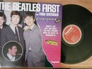 LP THE BEATLES FIRST IMPACT 825073