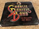 LP MINT THE CHARLIE DANIEL'S BAND A DECADE OF HITS 1983  VINYL ALBUM FE 38795