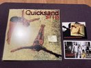 quicksand slip Brand New Never Spun Comes With Post Card Extras