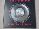 TRIUMPH  ROCK N ROLL MACHINE - SILVER VINYL LP RECORD