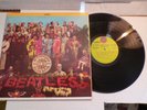 the BEATLES SGT. PEPPER 1969 GREEN LABEL WITH RARE ENLARGED PRINT ON TITLE