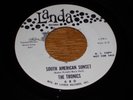 45RPM.  THE TRONICS.  THE BIG SCROUNGY /  SOUTH AMERICAN SUNSET.  VG++.