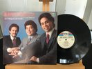 TOMMY OLIVENCIA Y SU ORQUESTA UN TRIÁNGULO DE TRIUNFO  TOP HITS TH-AM2171 USA