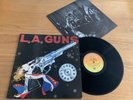 L.A. GUNS...COCKED & LOADED ...RARE UK FIRST ISSUE ALBUM..VERTIGO...838 592-1