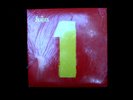 BEATLES #1 'S    SEALED  TWO RECORDS  MADE IN CANADA SLIGHT TEAR IN PLASTIC