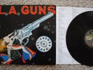 1 X VINYL FIRST PRESS L.A. GUNS COCKED & LOADED POLYGRAM 1989 guns and roses