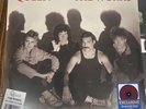 QUEEN- THE WORKS- USA ISSUE WITH HYPE- PURPLE COLOUR VINYL-- SEALED.