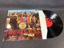 Ancien disque vinyle 33T The Beatles album Sergent peppers lonely heart