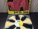 COWS – Sexy Pee Story LP AMREP 015 MELVINS Black & Light Mustard Yellow PinwheeL