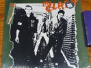 THE CLASH SELF TITLED THE CLASH LP STILL IN SHRINK FREE BONUS SINGLE INCLUDED